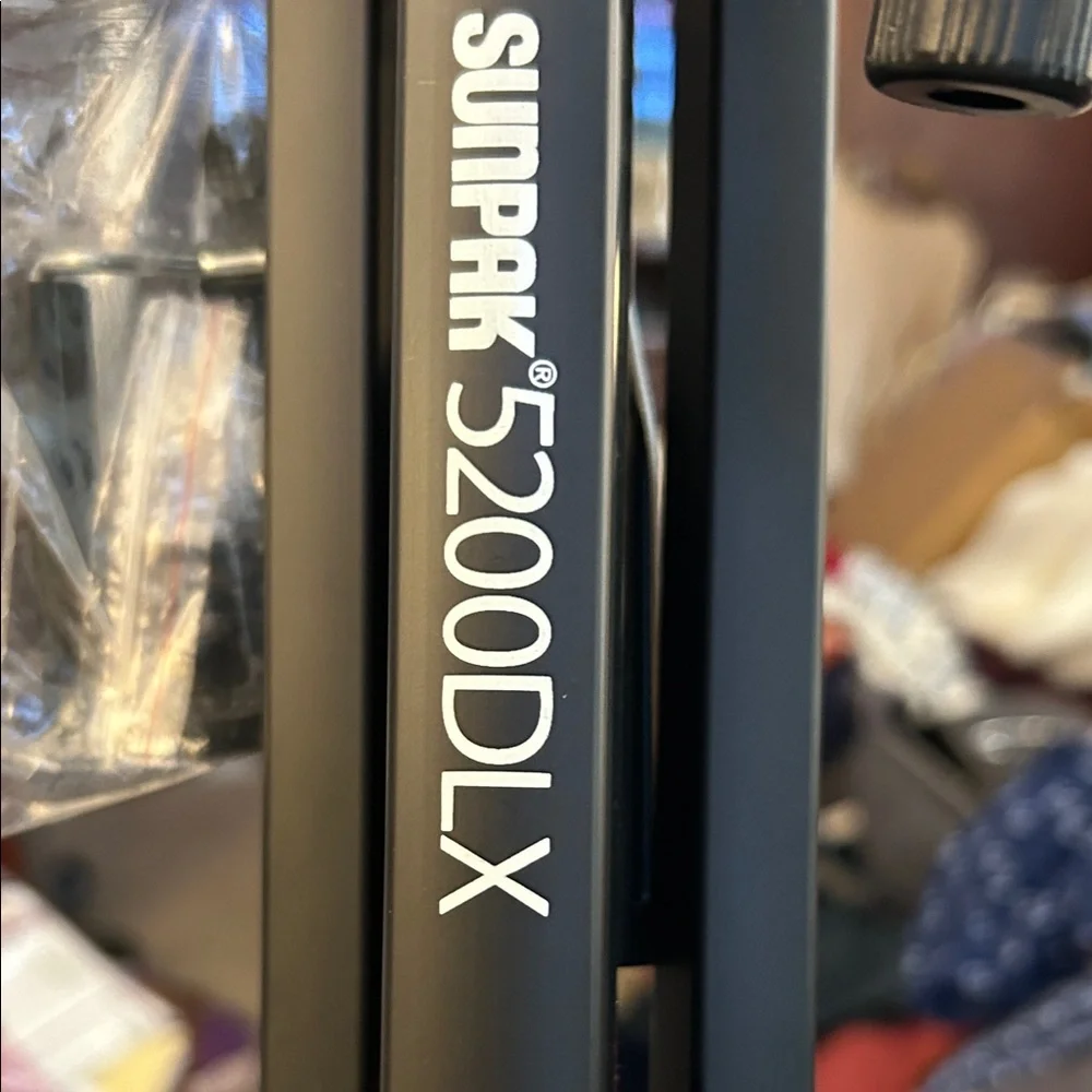 Black Camera Tripod sunpak 5200DLX